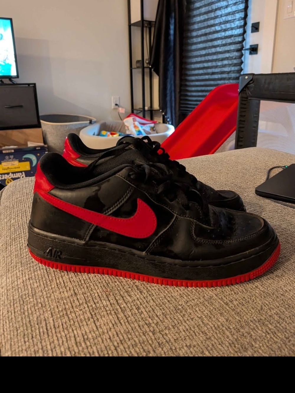 Nike Black Sneakers with Red Swoosh and Red Outsole